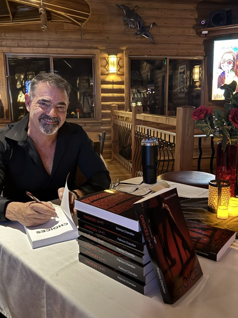 Link Miller signing books